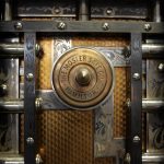 a close up of a metal door with a lock